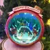 Animated musical Christmas village scene in ball design for table top decoration